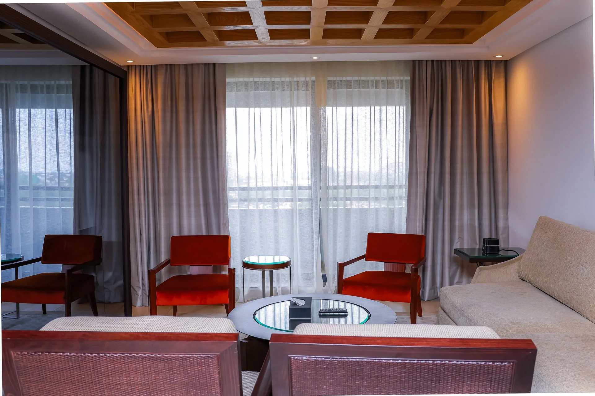 Warmly lit hotel guest lounge with a calm, welcoming interior